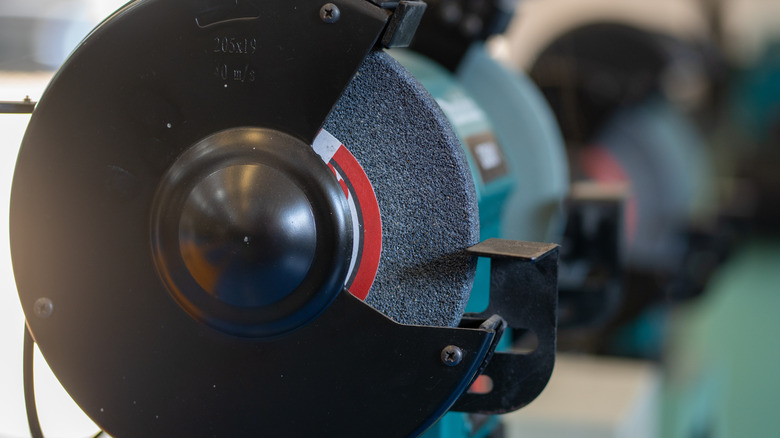 side view of a bench grinder