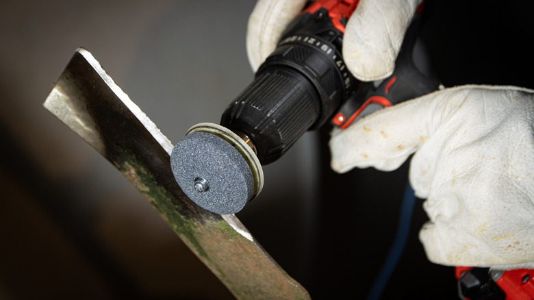 using drill attachment to sharpen blade