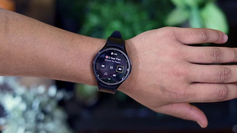 A person using universal gestures on a Samsung Galaxy watch