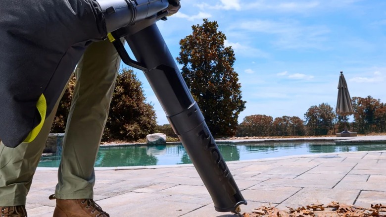 A person using the Ryobi 40V HP Brushless Leaf Vacuum/Mulcher.