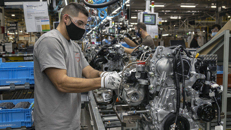 Shot in Decherd, Tennessee Nissan engine plant, showing 2022 Nissan Rogue's 1.5-liter VC-Turbo 3-cylinder engine being produced