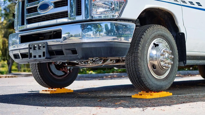 An RV parked on leveling blocks