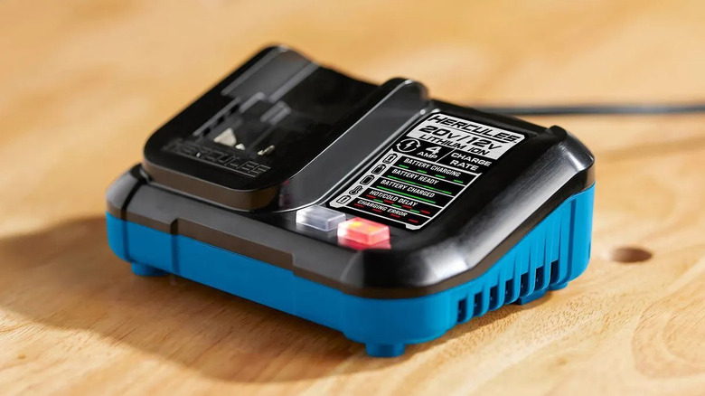 Hercules dual-voltage battery charger on a worktop
