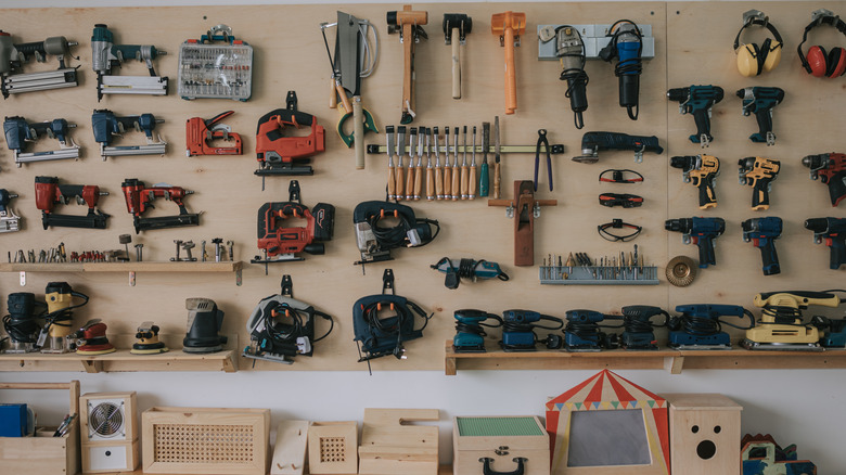 A view of an organized toolboard in a garage