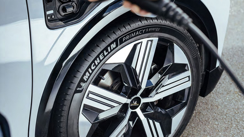 Detail view of Michelin Primacy 5 Energy tire on electric SUV.