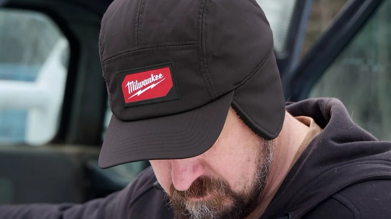 A man wearing a Milwaukee sherpa-lined hat.