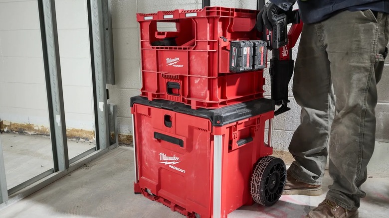 A stack of Milwaukee Packout crates holding various tools.