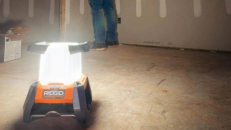 Ridgid 360° area light being used to illuminate a dark work site.