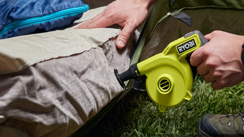 Blowing up an air bed with a Ryobi USB Lithium high volume inflator