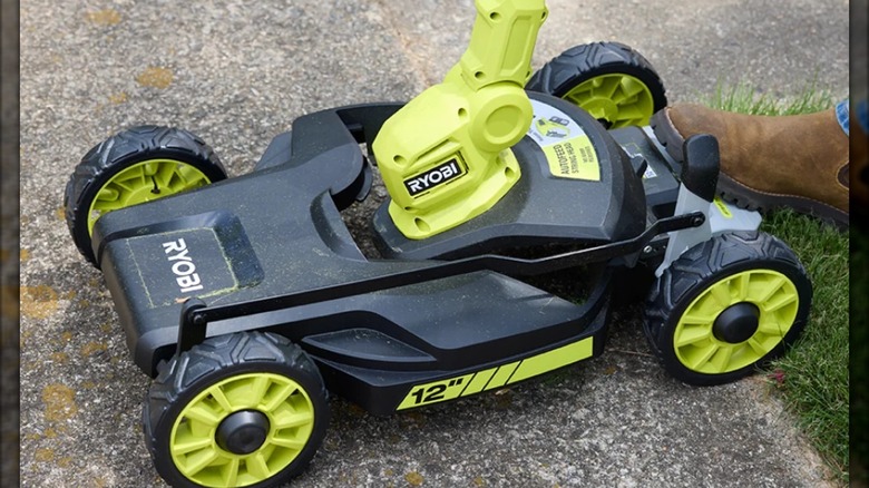 18V One+ 12-inch 3-in-1 Mower/String Trimmer/Edger in use