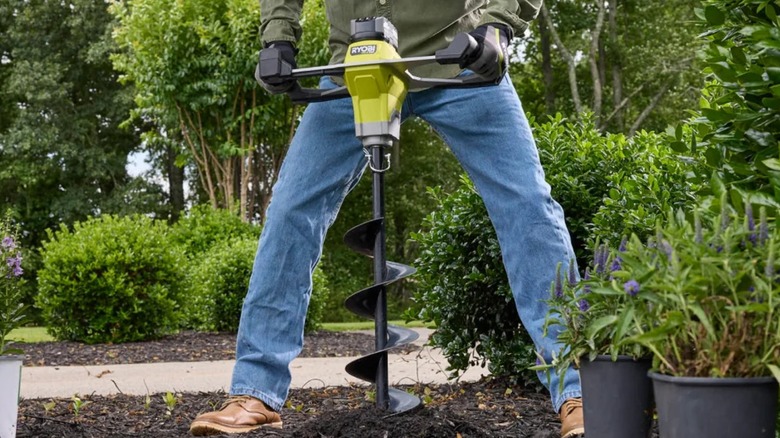 Ryobi 18V One+ HP 6-inch Earth Auger in use
