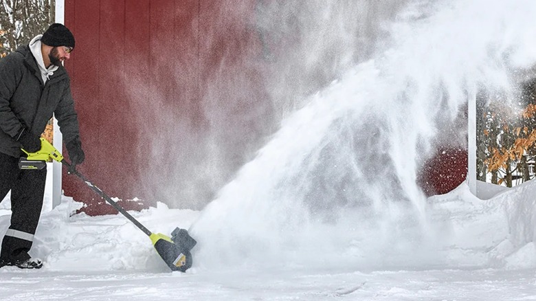 Ryobi 40V 12-inch Snow Shovel in use