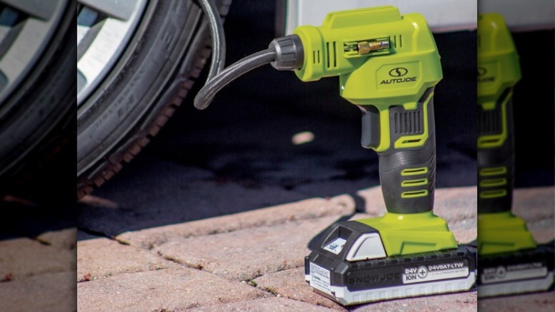 Auto Joe 24V Cordless Digital Air Compressor connected to tire