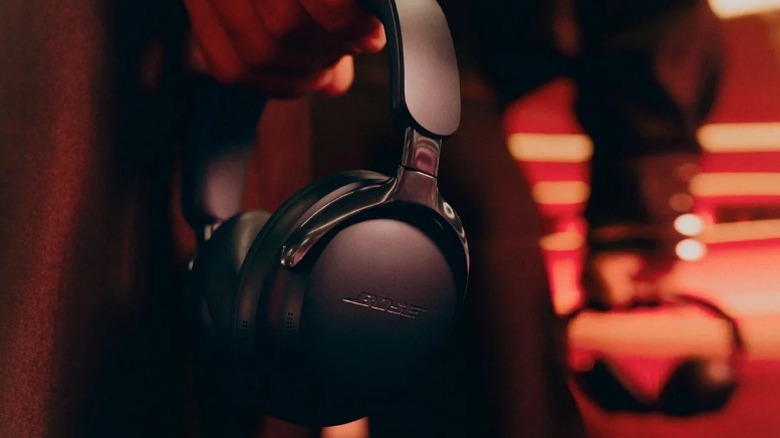 Person holding Bose QuietComfort Ultra Headphones Gen2 headphones