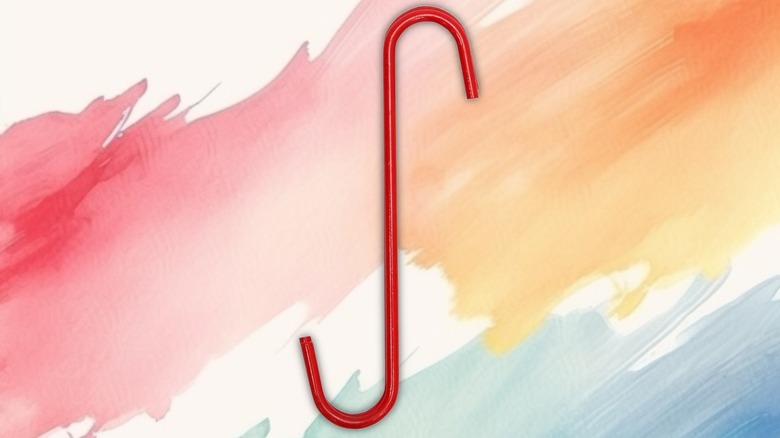 Auto Caliper Hanger Set on a painted background.