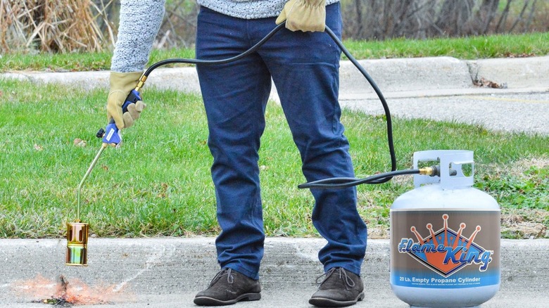 Flame King Propane Torch Weed Burner in use