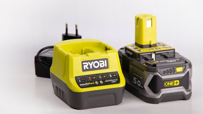 Ryobi battery next to charger