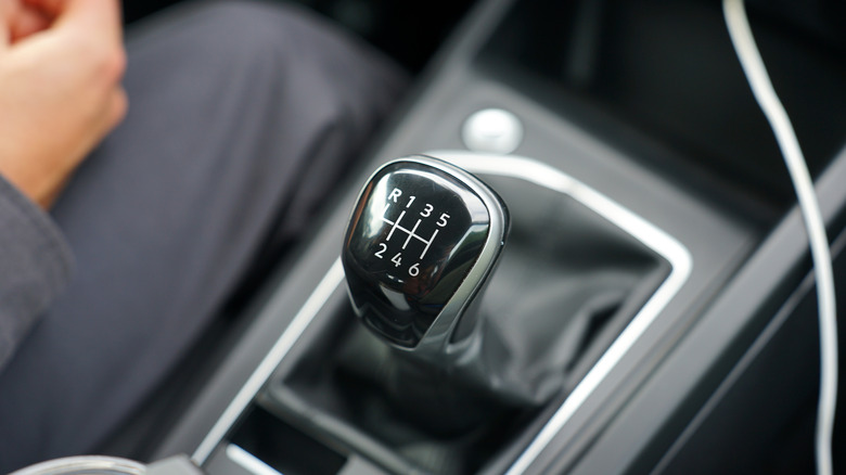 Close-up of a manual transmission vehicle lever.