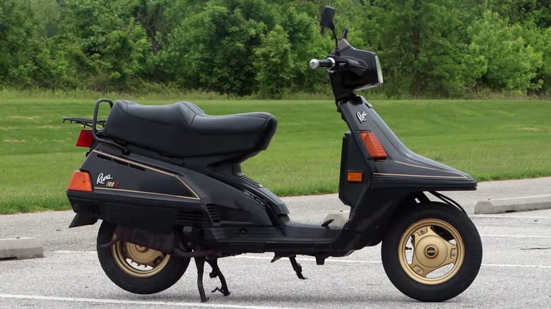 Yamaha Riva 180 in parking lot