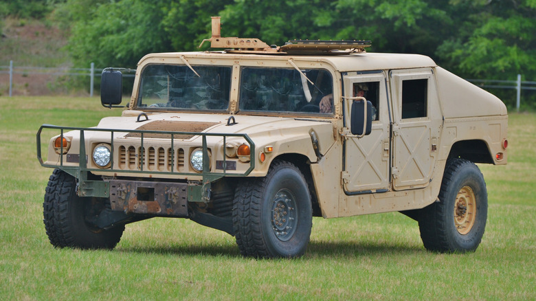 a Humvee parked on grass