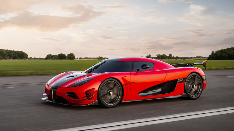A red 2020 Koenigsegg Agera RS driving