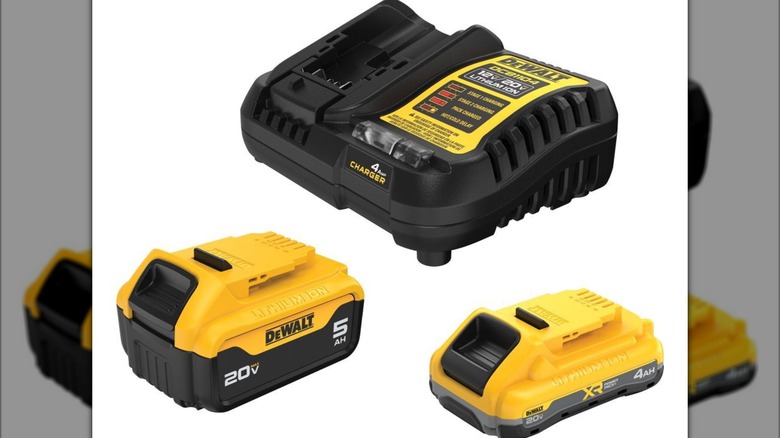 A stock image of DeWalt batteries with a charger.
