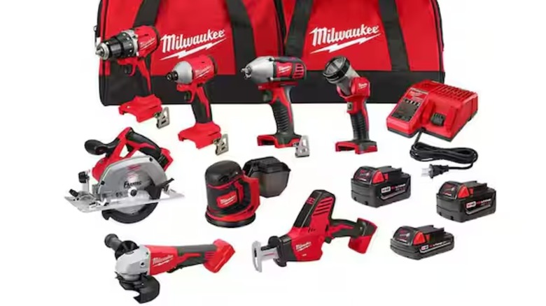 A stock image of Milwaukee tools, batteries, and bags.