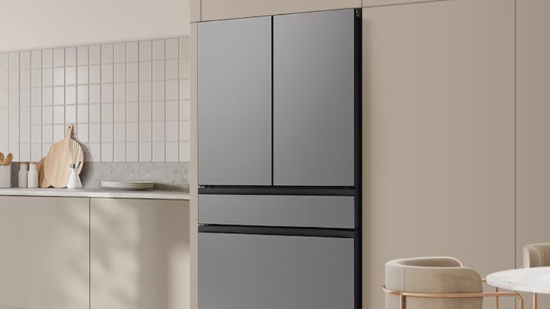 Samsung Bespoke 4-Door French Door refrigerator in a modern living room