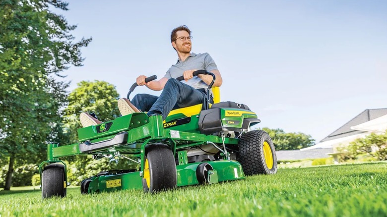 cutting lawn with John Deere zero-turn mower