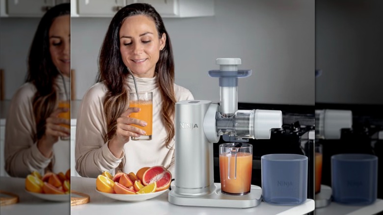 woman making juice with Ninja NeverClog