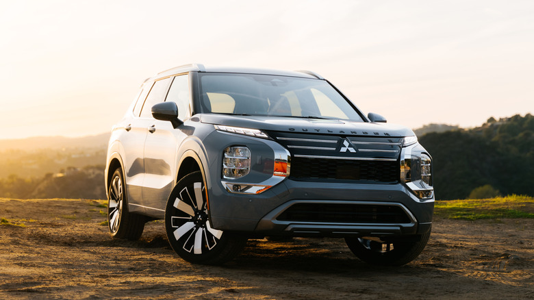 A silver 2025 Mitsubishi Outlander parked