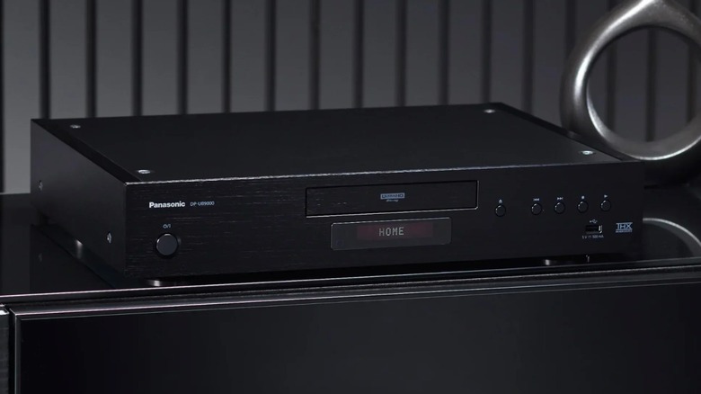 Panasonic DP-UB9000P1K Blu-ray player on a shelf