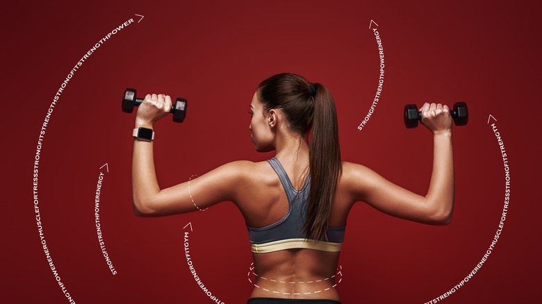 woman lifting weights wearing Apple Watch