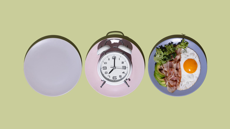 three plates with clock and food