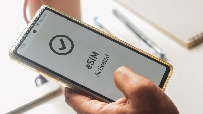 A smartphone with the eSIM activated message