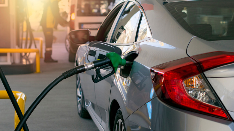 Car refueling at a gas station