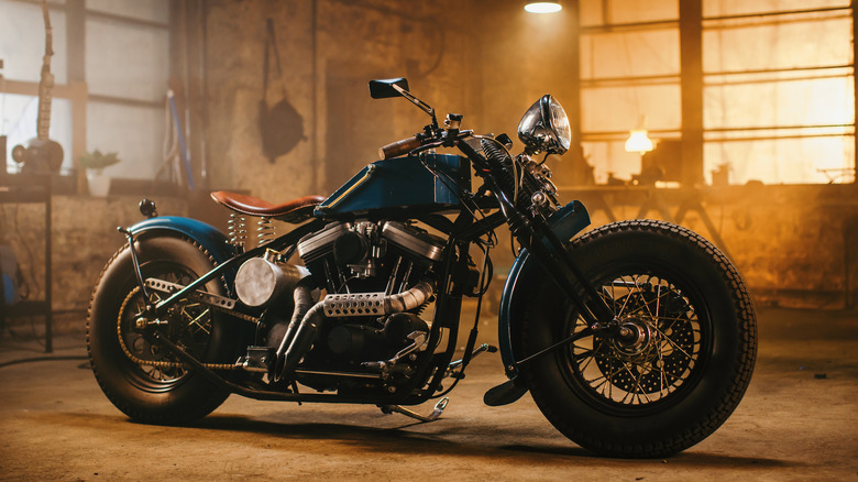 bobber motorcycle in garage