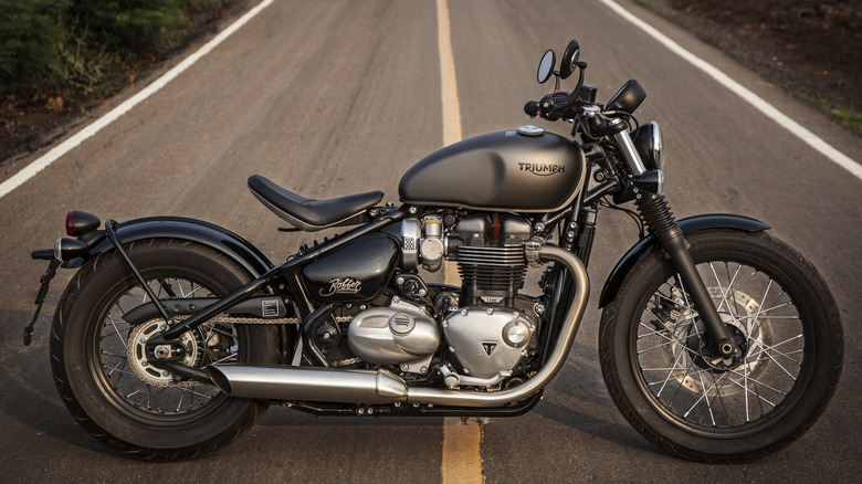 a Triumph Bonneville Bobber on road