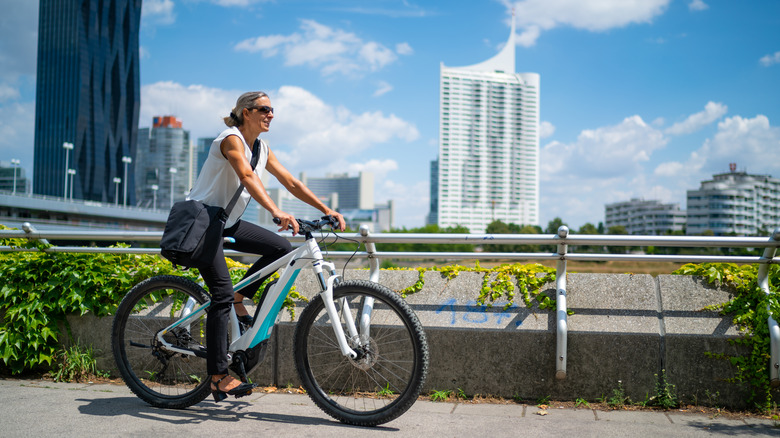 Person riding e-bike in city