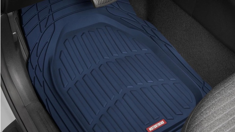 Blue Motor Trend car mat on driver's side