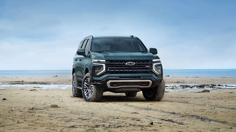 A green 2025 Chevrolet Tahoe Z71 parked on a beach