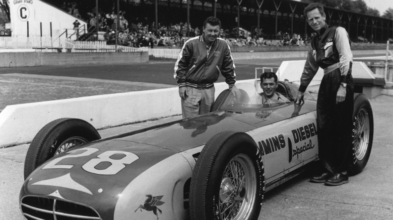 A black and white photo of a Cummins-powered Indy car