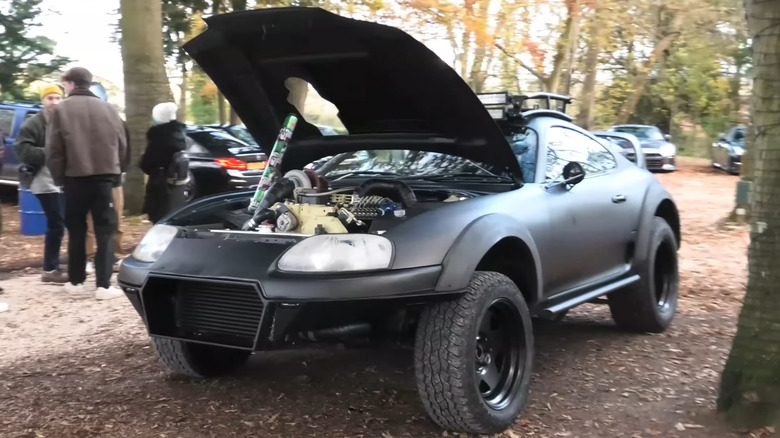 A Cummins 6BT powered Toyota Supra parked in a camping area