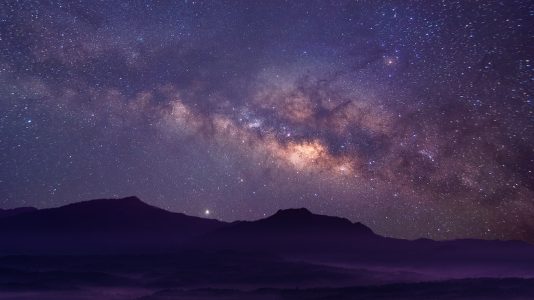 milky way over mountains