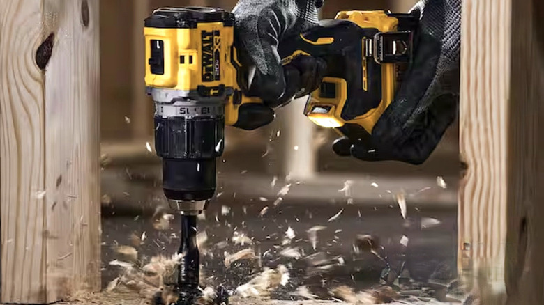 Person using DeWalt power tool
