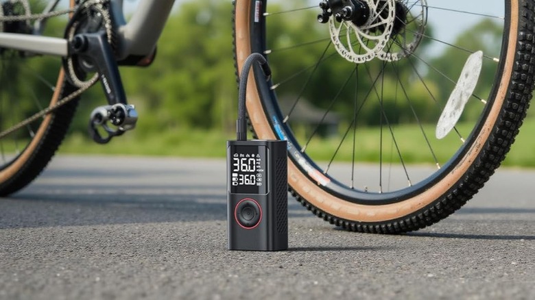 The Powools Air Compressor being use on a bike tire.