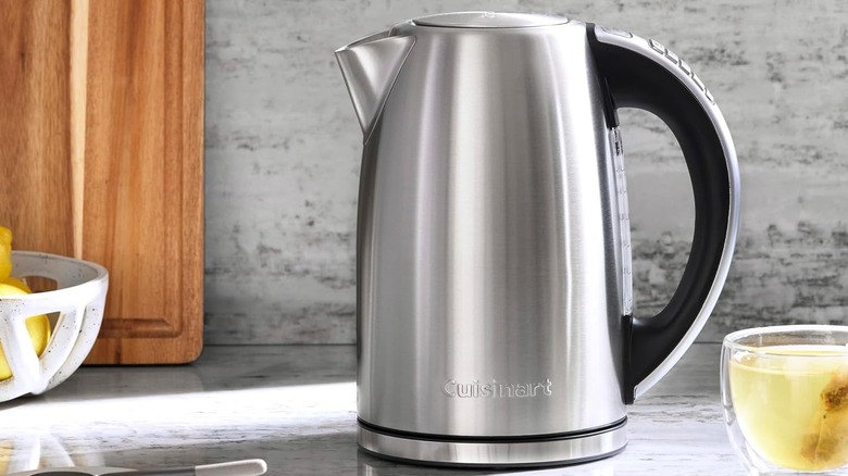 Cuisinart kettle next to a glass of tea