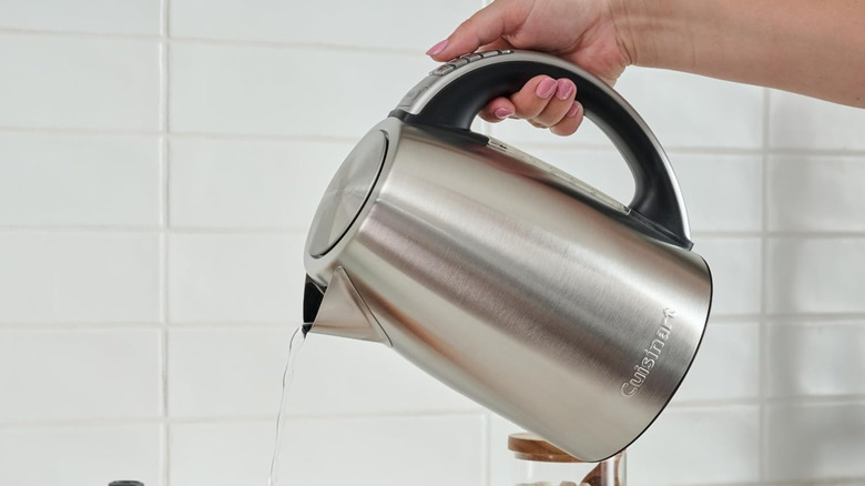 Pouring water from a Cuisinart electric kettle