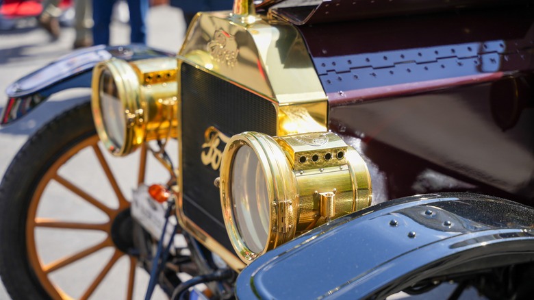 Brass and black front end of a Ford Model T