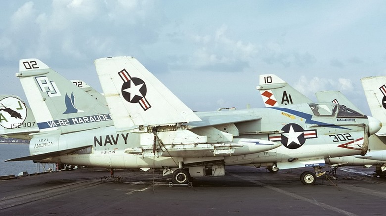 An LTV A-7 Corsair II parked on the deck of an aircraft carrier